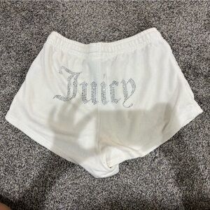 Juicy Couture white shorts with silver rhinestone logo.
